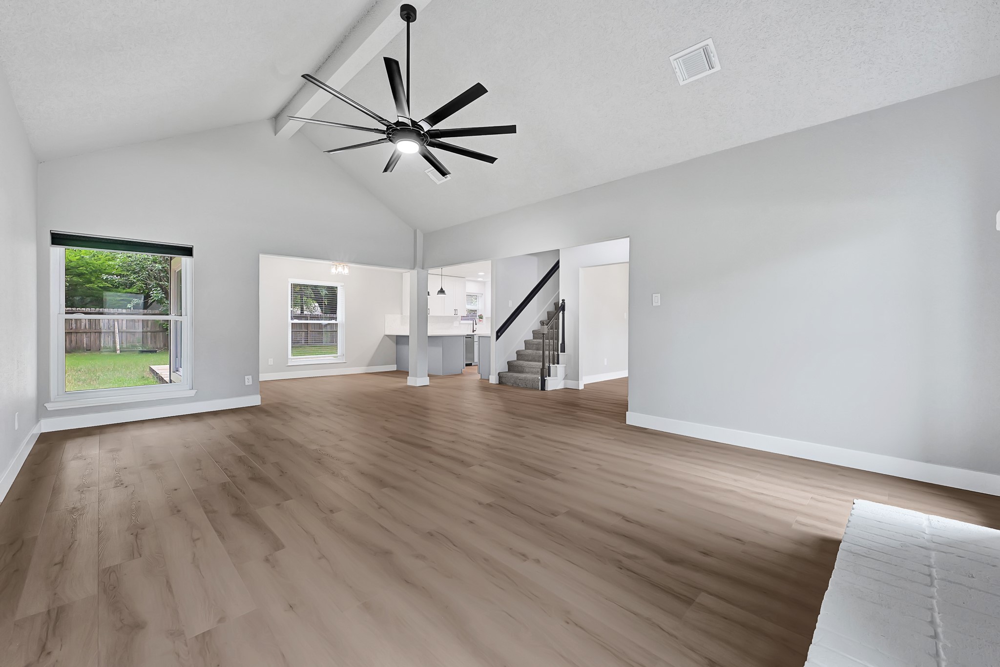 21211 Slippery Creek Lane Spring, TX 77388 - Photo 10 of 29 a view of empty room with wooden floor and fan