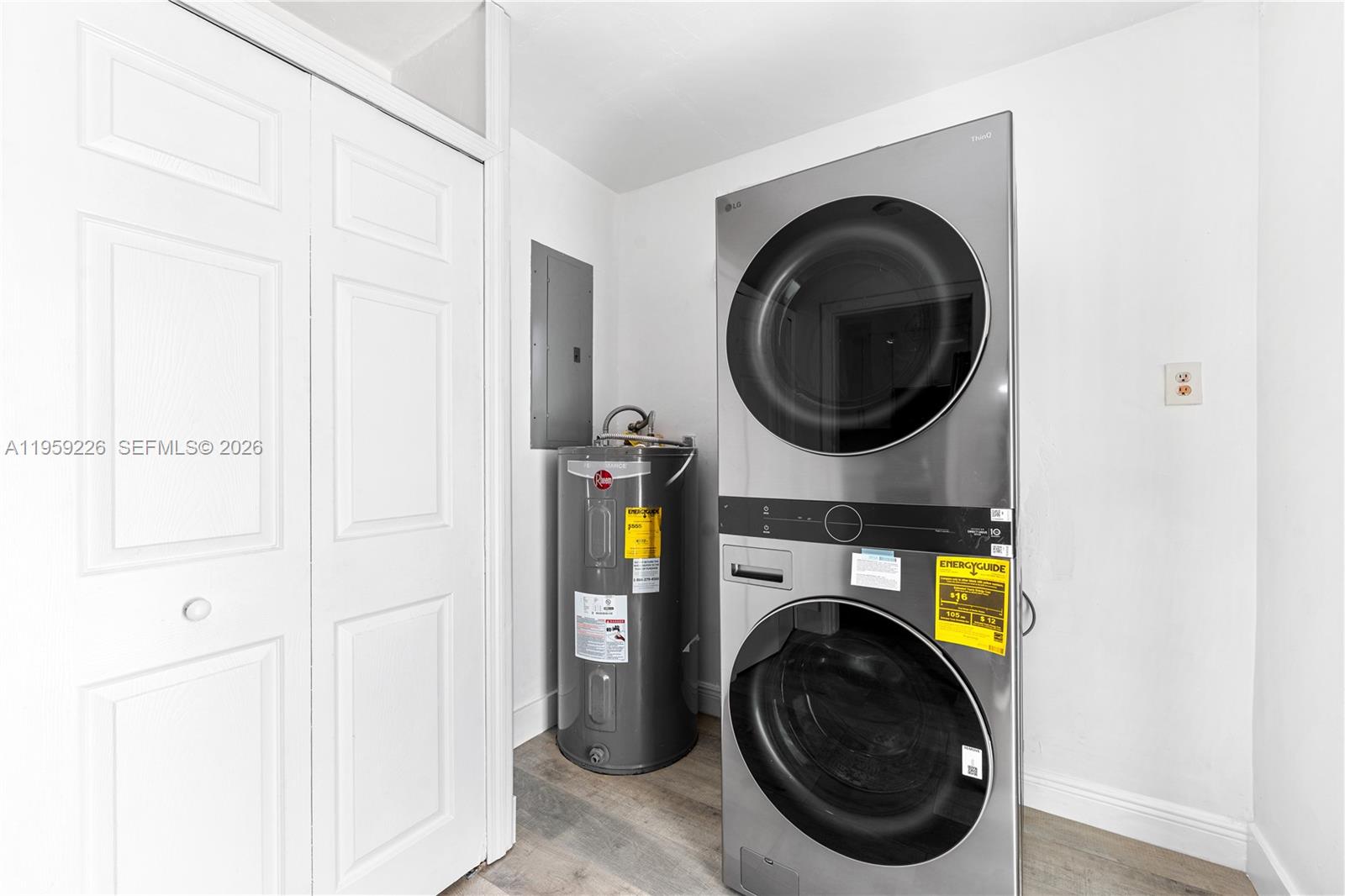 11970 Southwest 177th Terrace Miami, FL 33177 - Photo 16 of 47 a utility room with dryer and washer