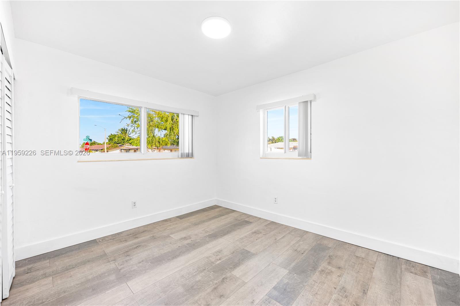 11970 Southwest 177th Terrace Miami, FL 33177 - Photo 23 of 47 an empty room with a window