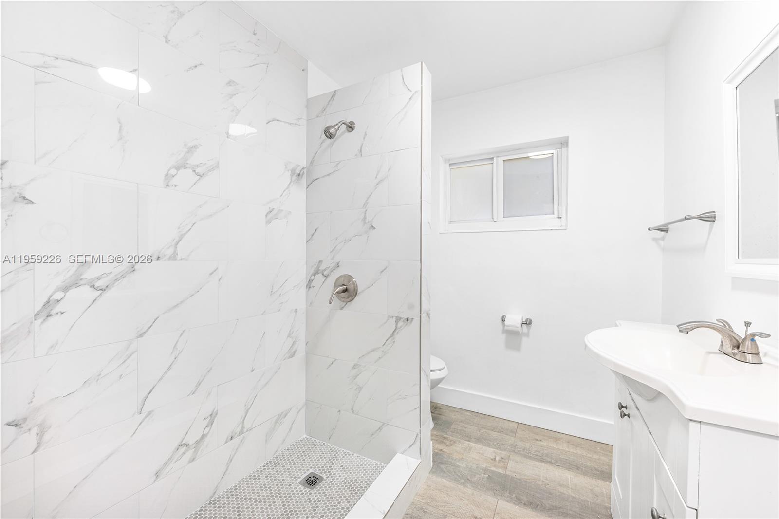 11970 Southwest 177th Terrace Miami, FL 33177 - Photo 25 of 47 a bathroom with a shower and a sink