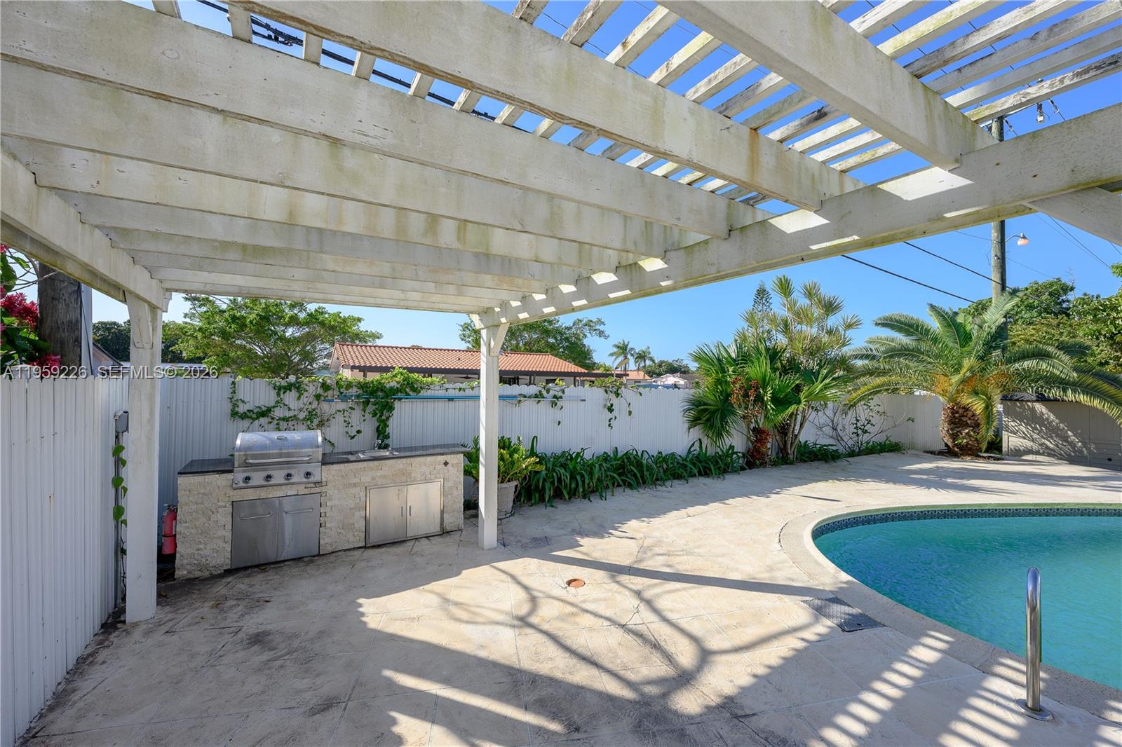 11970 Southwest 177th Terrace Miami, FL 33177 - Photo 32 of 47 a view of a backyard