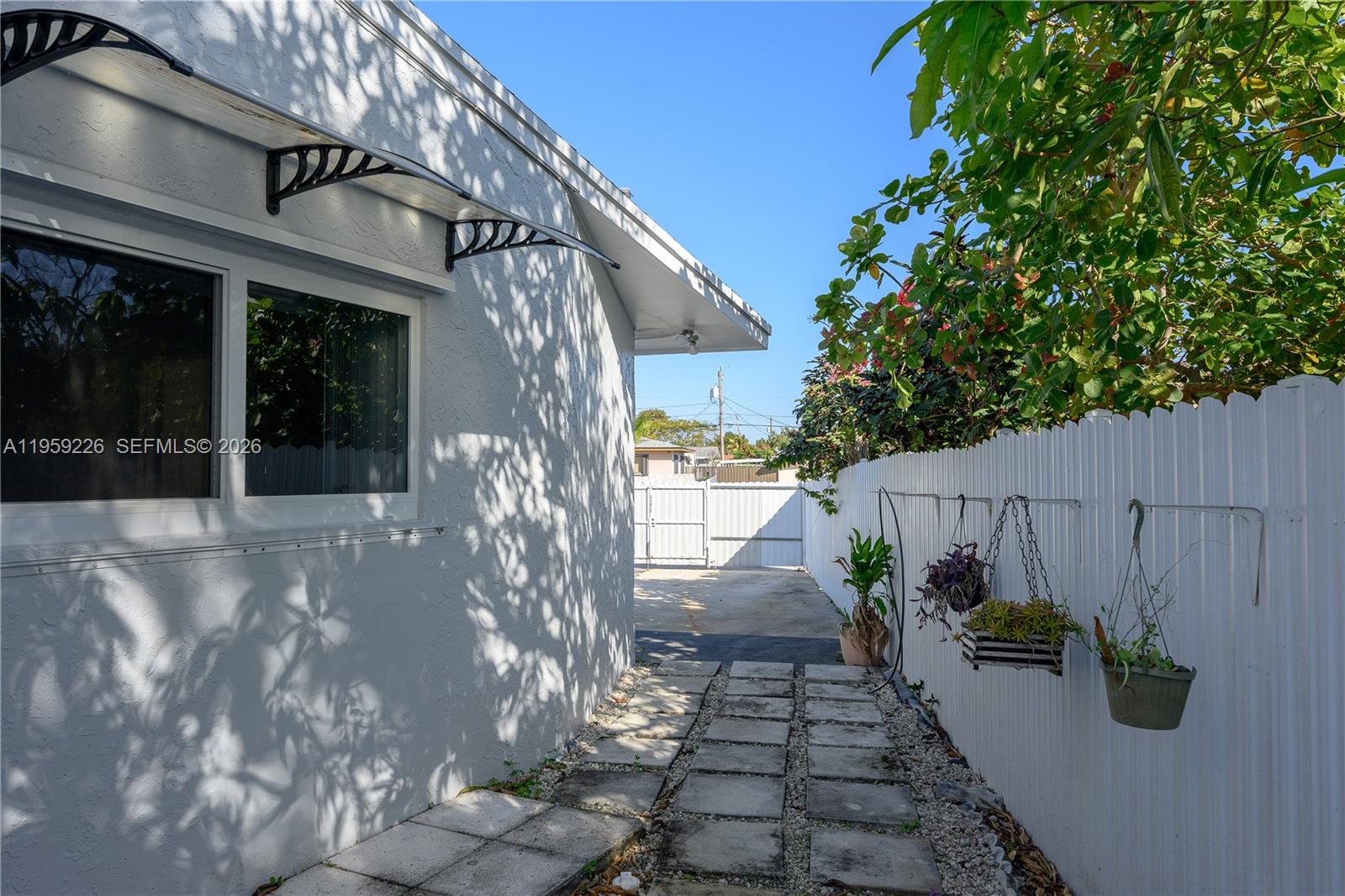 11970 Southwest 177th Terrace Miami, FL 33177 - Photo 37 of 47 a view of a pathway of a house