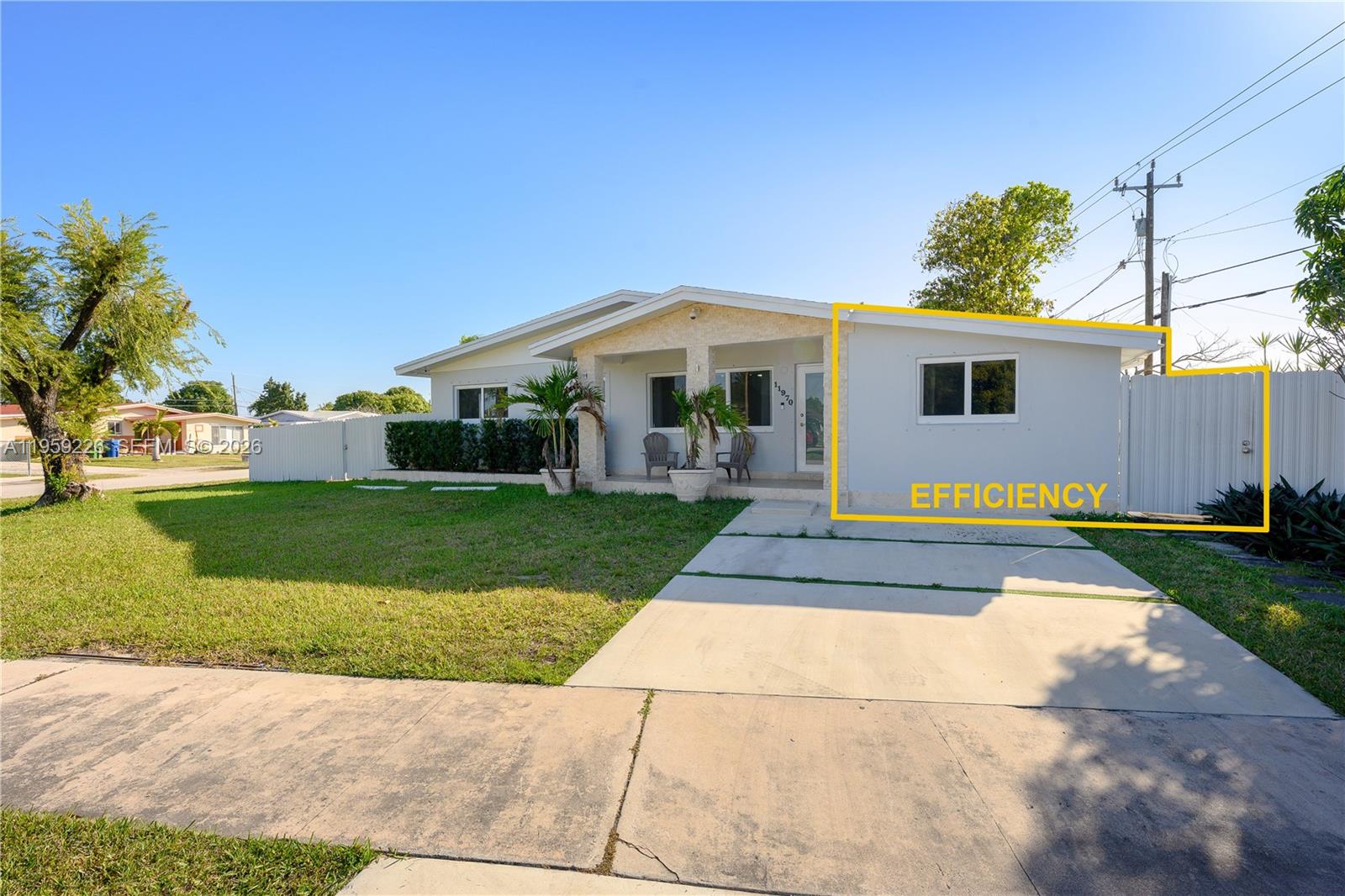 11970 Southwest 177th Terrace Miami, FL 33177 - Photo 5 of 47 a view of house with a yard