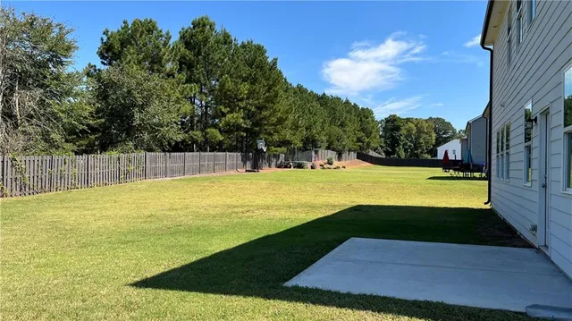 a view of a swimming pool with an outdoor space