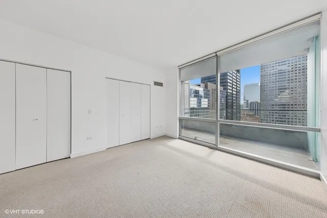 a view of an empty room with sliding door