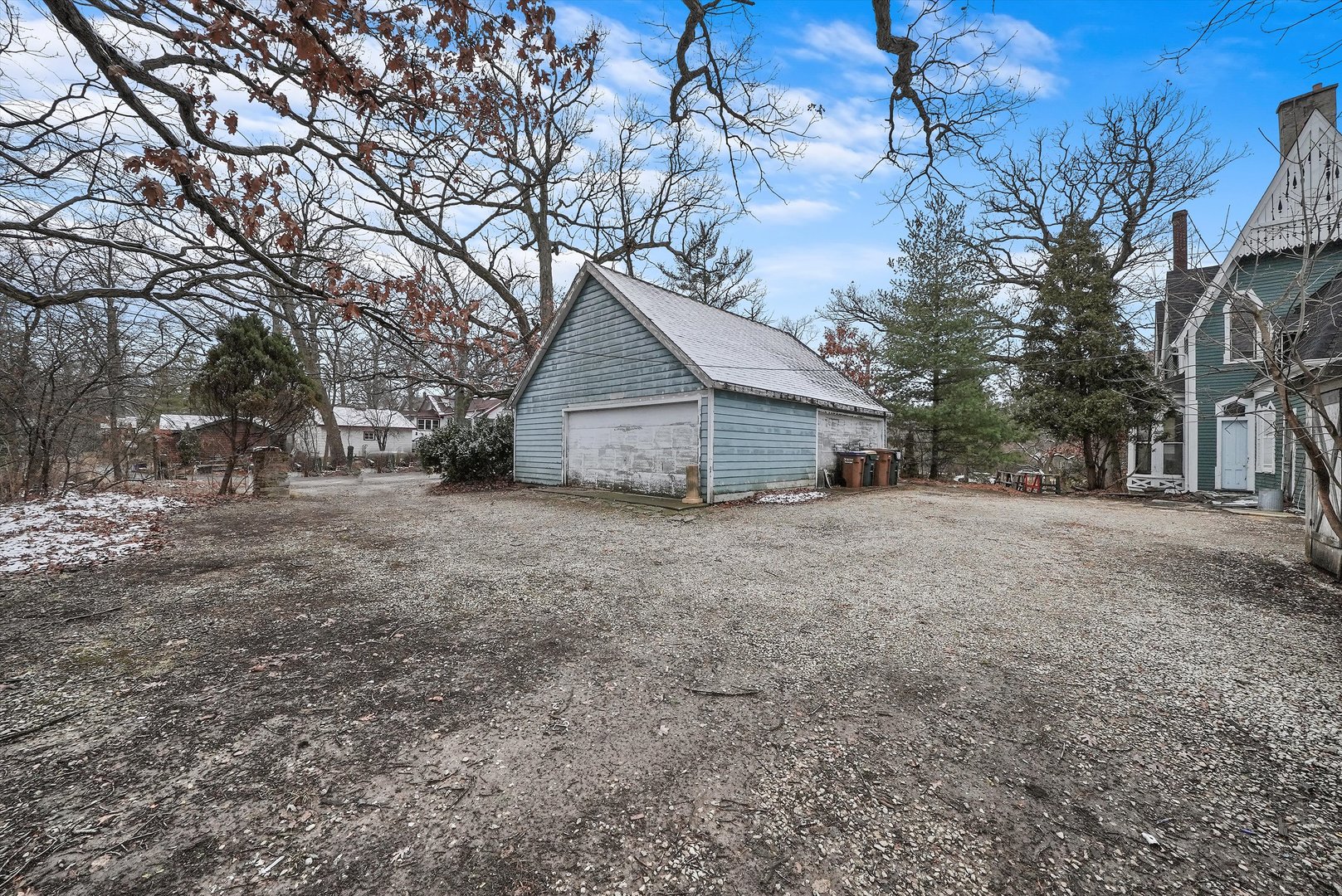 112 South Charleton Street Willow Springs, IL 60480 - Photo 27 of 34 a house with trees in front of it