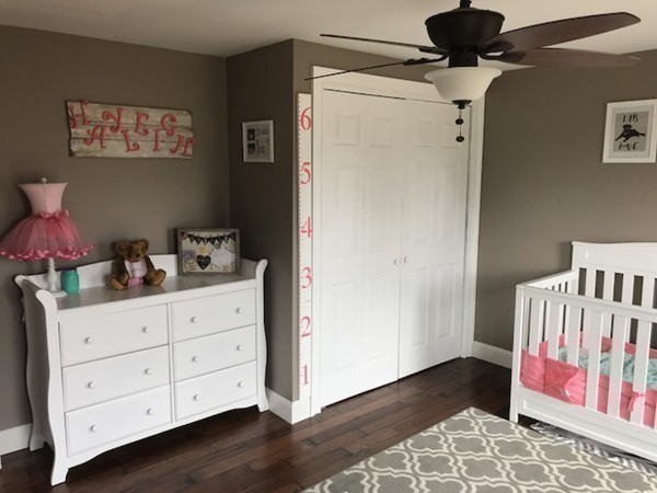 720 East Hill Road East Oakham, MA 01068 - Photo 17 of 25 a bedroom with a bed and wooden floor
