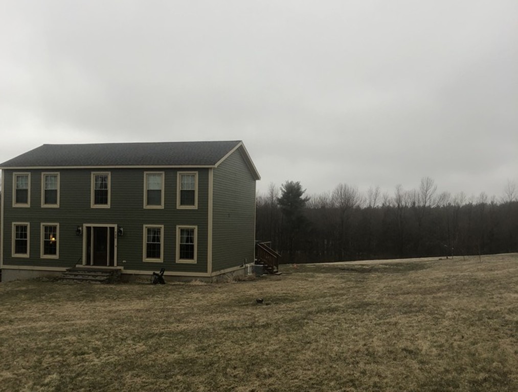 720 East Hill Road East Oakham, MA 01068 - Photo 25 of 25 a backyard of a house