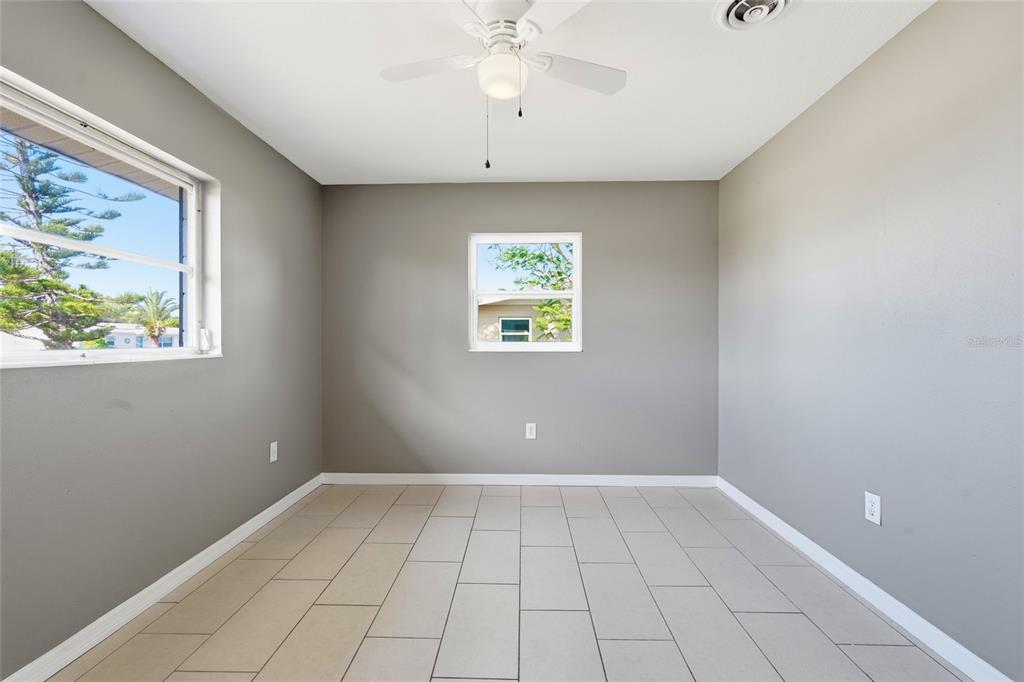 363 Glen Oak Road Venice, FL 34293 - Photo 44 of 53 a view of an empty room with a window