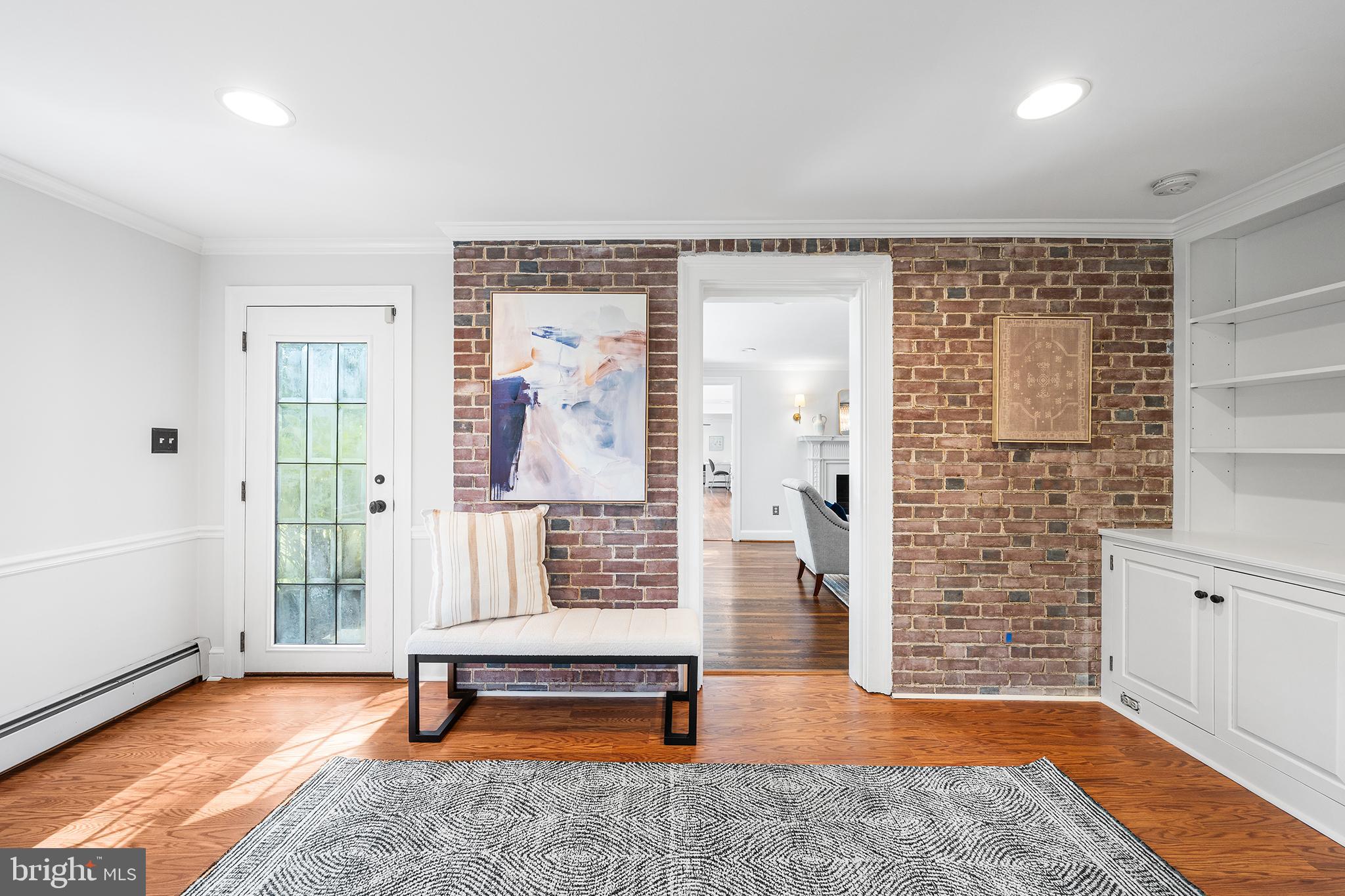 2 Forest Road Wayne, PA 19087 - Photo 16 of 33 Exposed brick wall in office with built-ins
