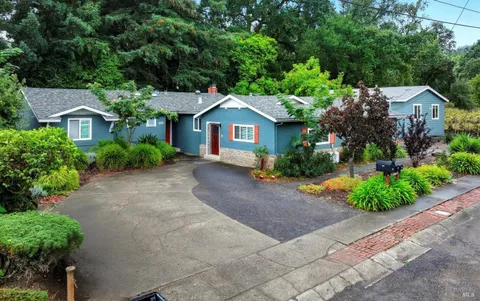 a house view with a garden space