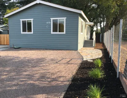 a view of a backyard of the house