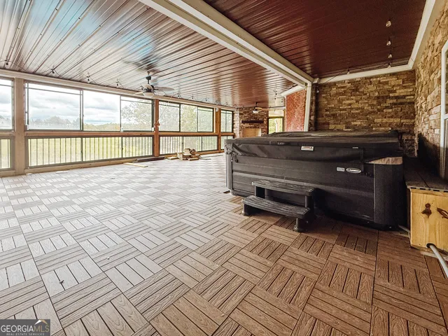 a aerial view of a house with yard