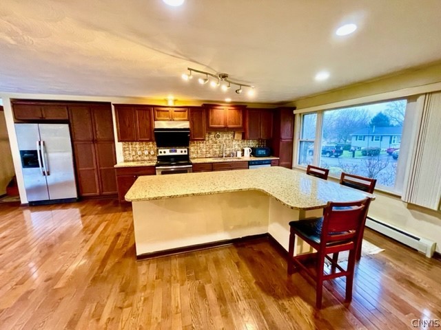 7 Aiken Drive Auburn, NY 13021 - Photo 13 of 34 Kitchen and breakfast bar