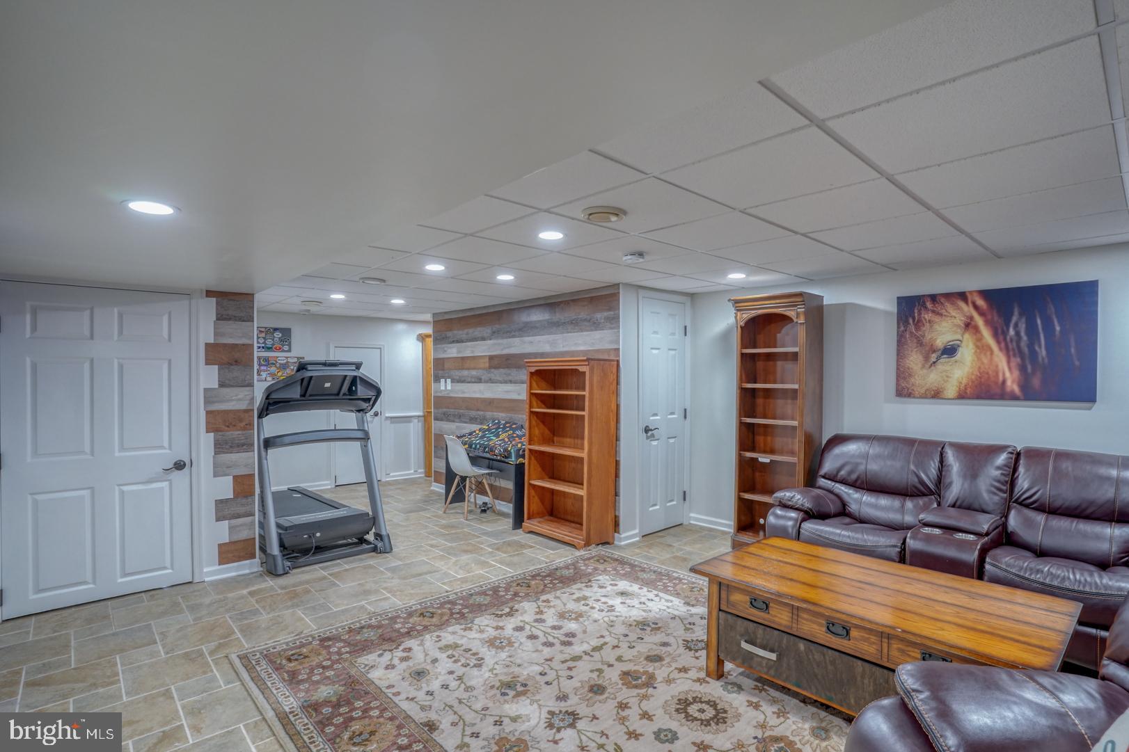 212 Mike Drive Elkton, MD 21921 - Photo 30 of 39 a living room with furniture and a flat screen tv