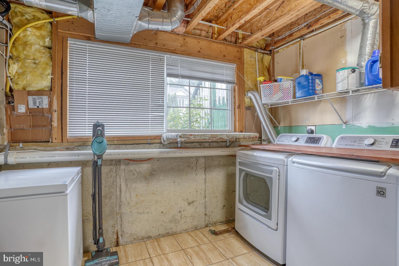 212 Mike Drive Elkton, MD 21921 - Photo 34 of 39 a kitchen with a sink and a stove next to a window