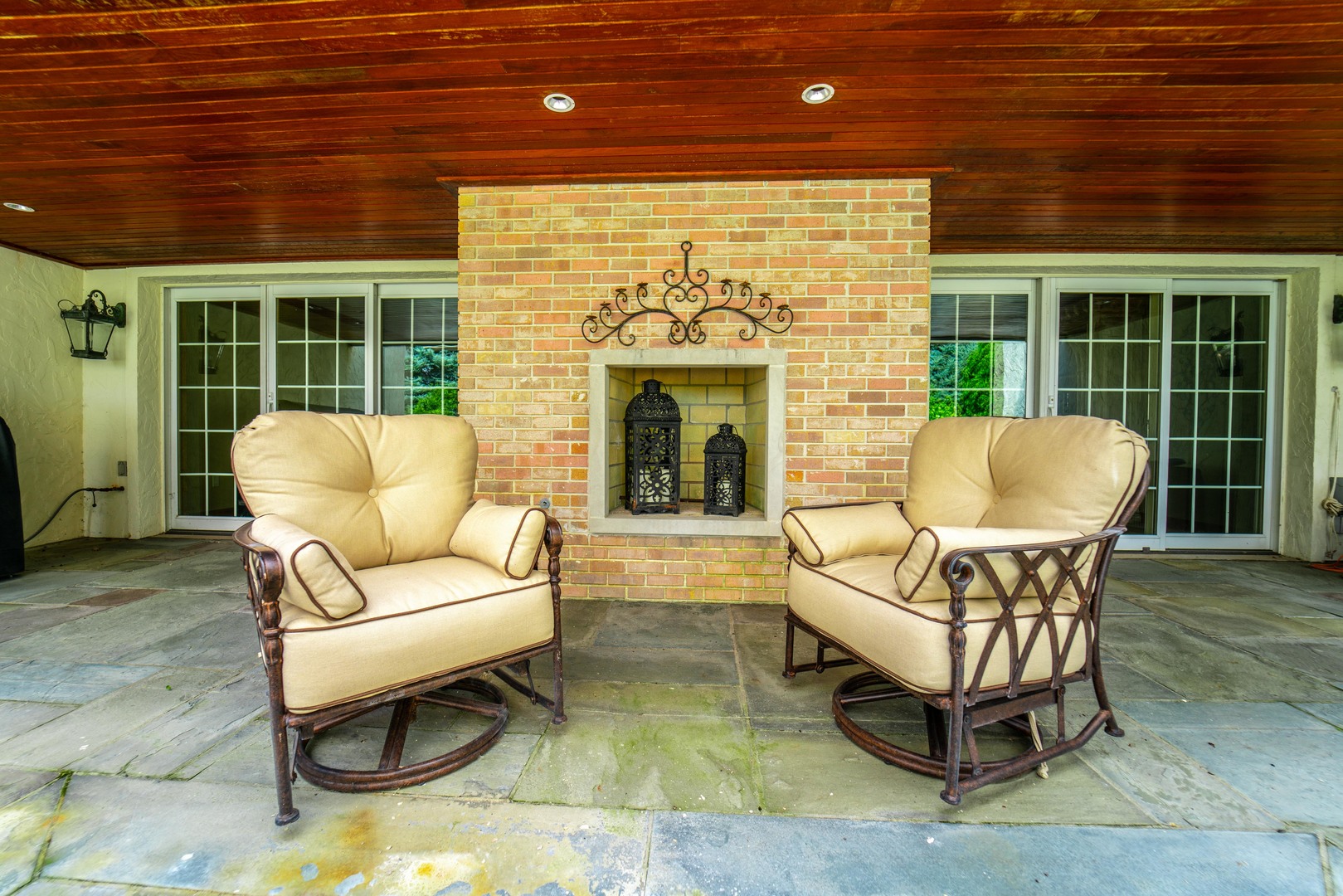 228 East Goodenow Road Beecher, IL 60401 - Photo 55 of 79 a living room with furniture a flat screen tv and a fireplace