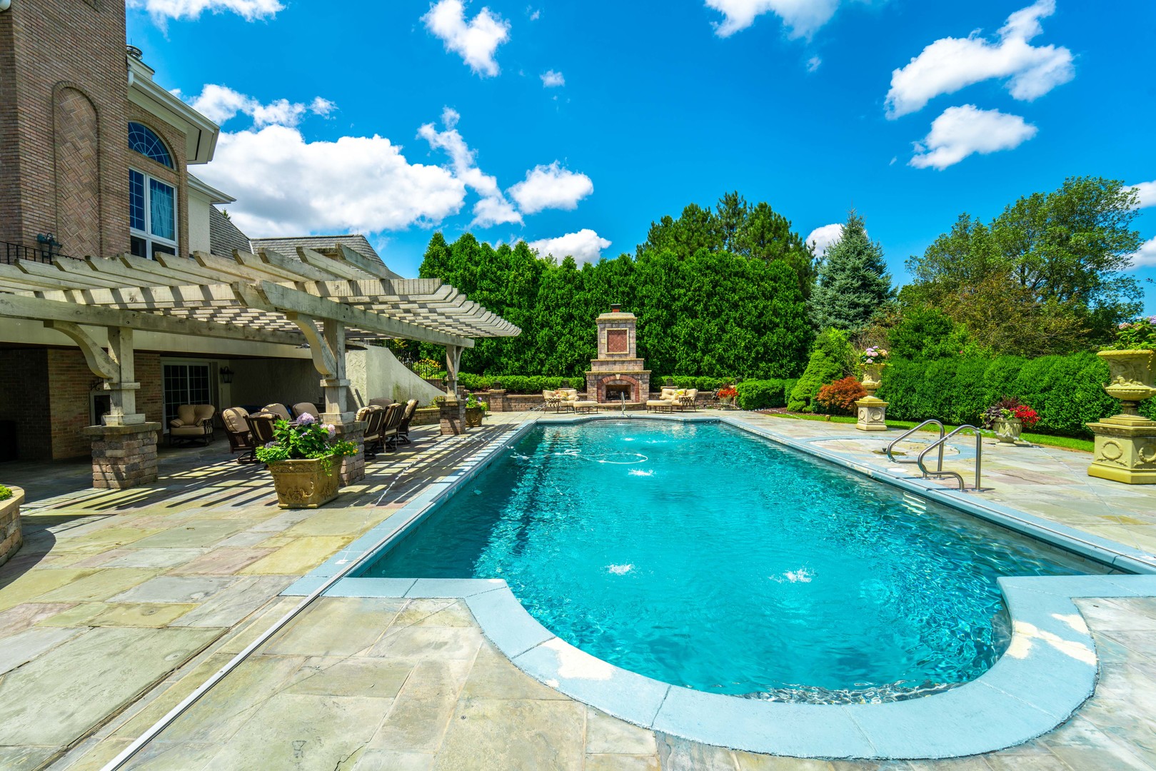 228 East Goodenow Road Beecher, IL 60401 - Photo 57 of 79 a view of a swimming pool with a patio