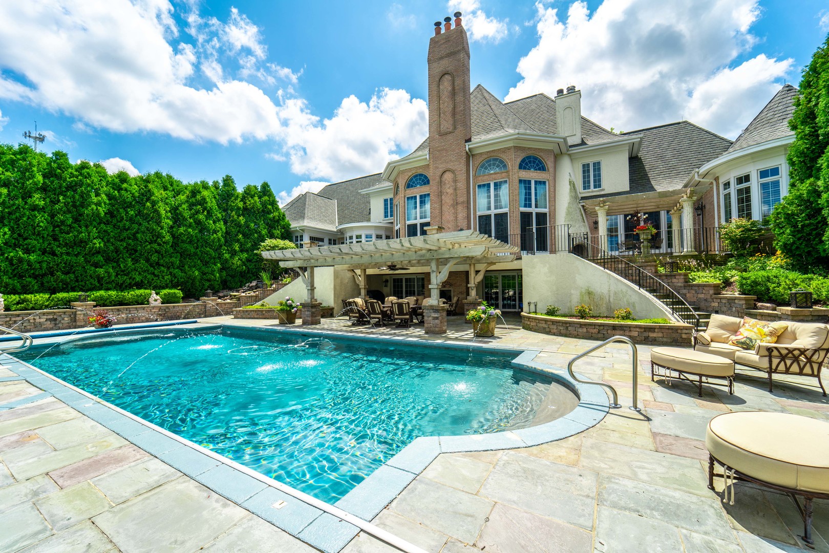 228 East Goodenow Road Beecher, IL 60401 - Photo 60 of 79 a front view of a house with swimming pool having outdoor seating