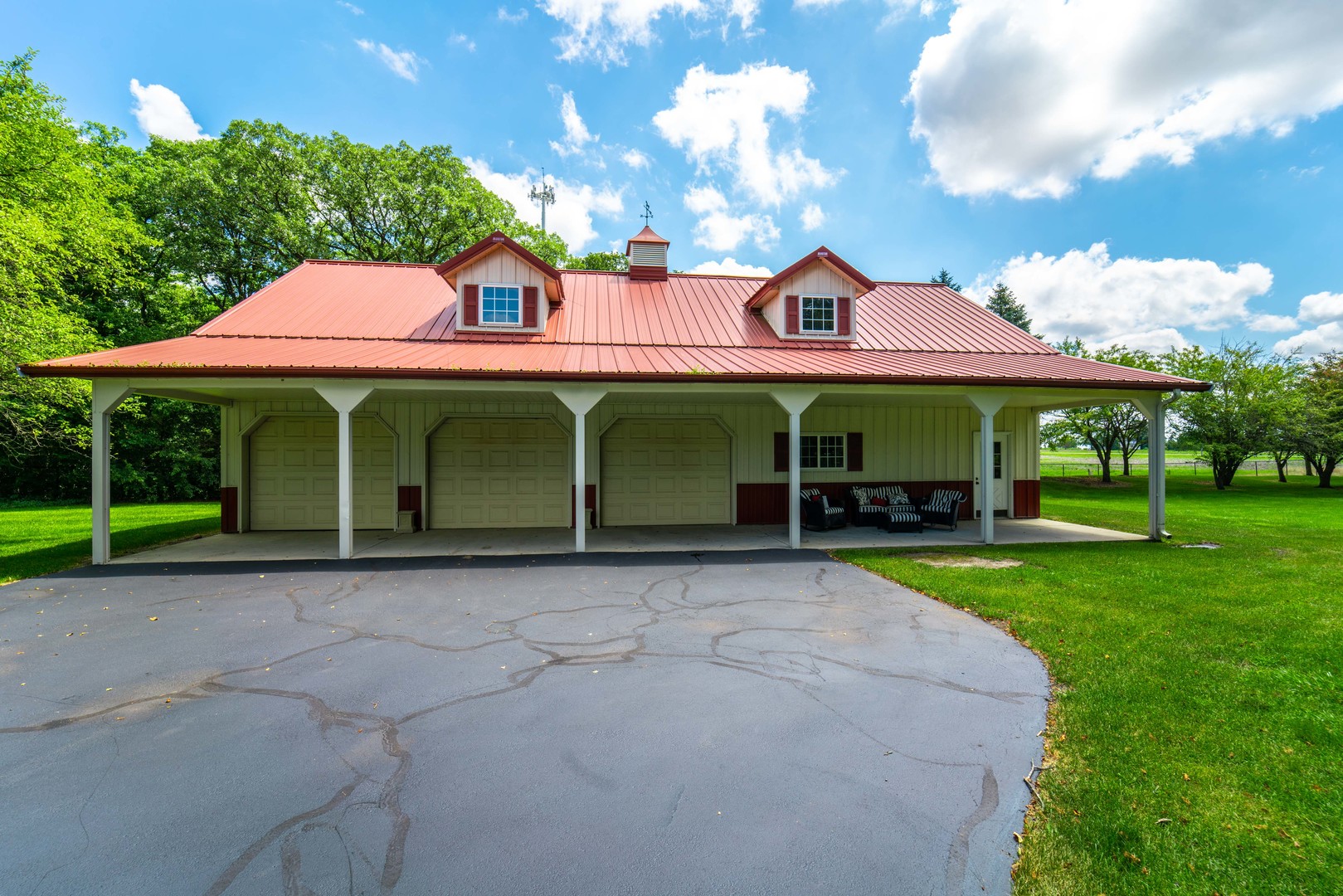 228 East Goodenow Road Beecher, IL 60401 - Photo 66 of 79 a view of a house with a yard and sitting area