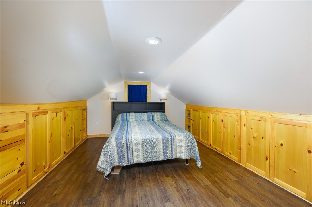 241 Everhard Road Southwest North Canton, OH 44709 - Photo 16 of 21 Upstairs bedroom with wood flooring and built-in dresser drawers