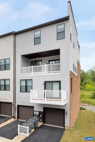 a front view of a house with a balcony