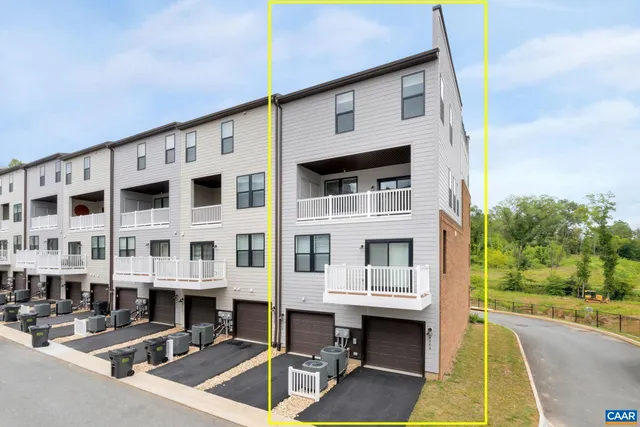 a front view of building with yard