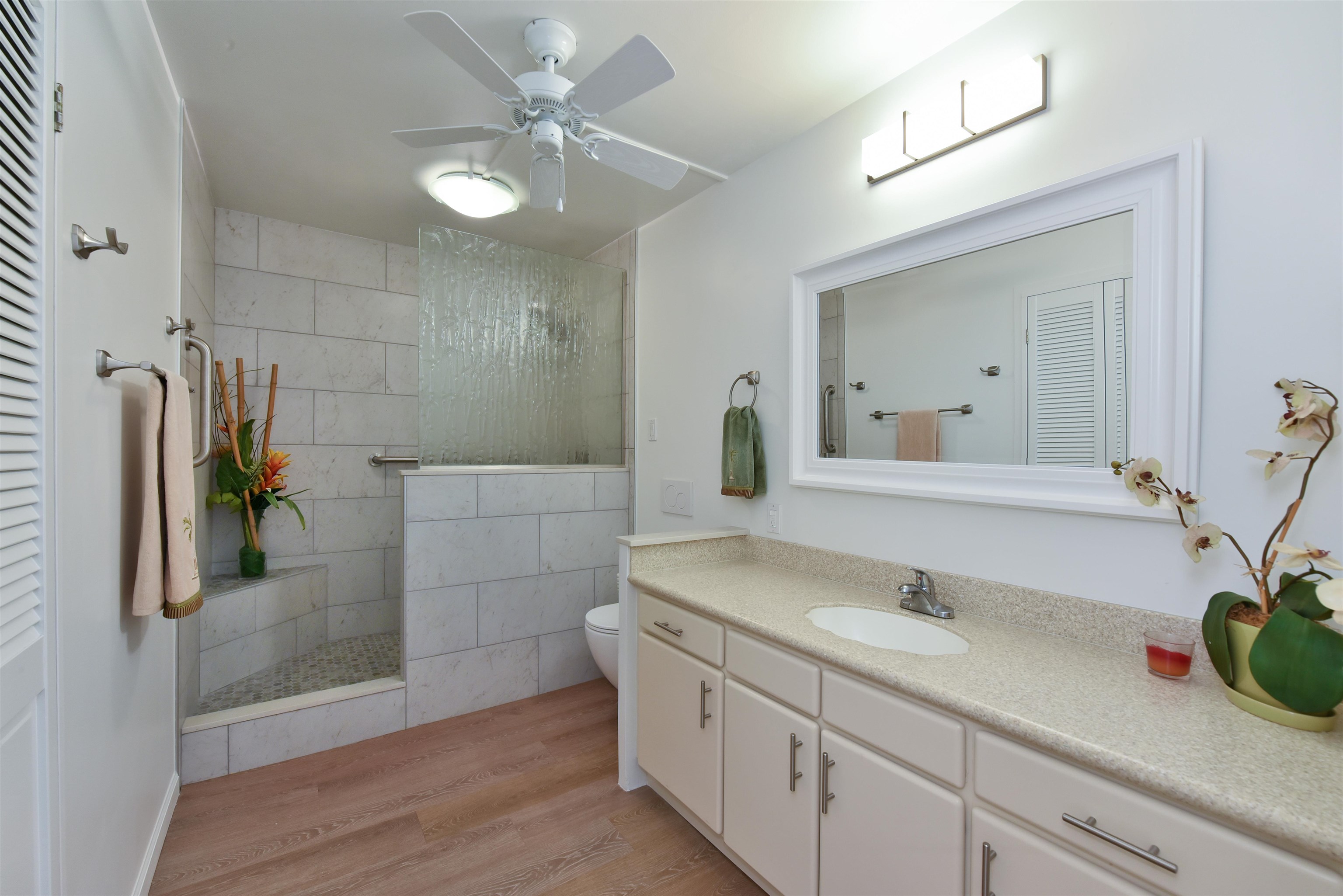 1403 Front Street, Unit 308 Lahaina, HI 96761 - Photo 14 of 35 a bathroom with a sink and a mirror