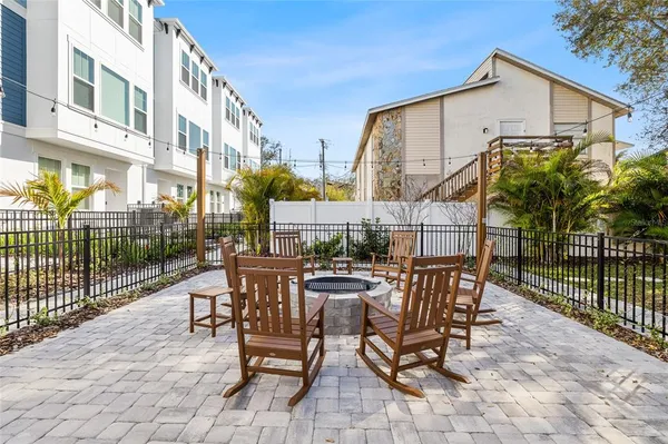 a view of a terrace with sitting area