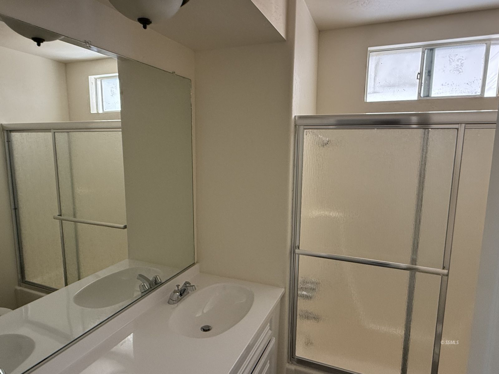 1345 West Upjohn Avenue Ridgecrest, CA 93555 - Photo 9 of 9 a bathroom with a bathtub and a window