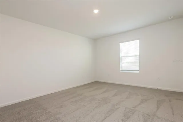 a kitchen with stainless steel appliances a refrigerator sink and stove
