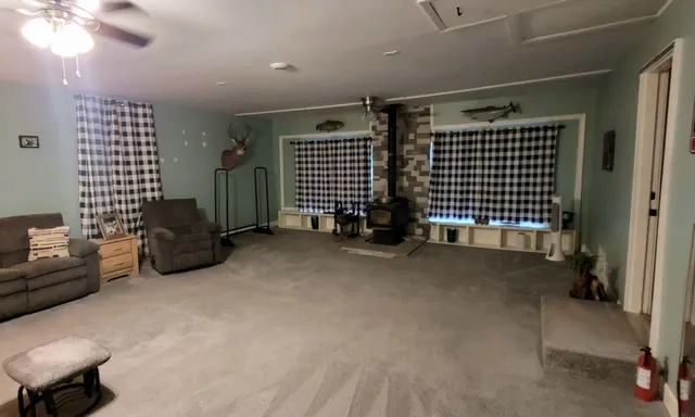 a view of livingroom with furniture and windows