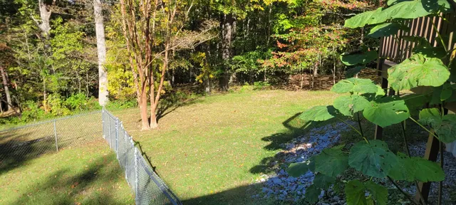 a view of a chairs and table in the balcony