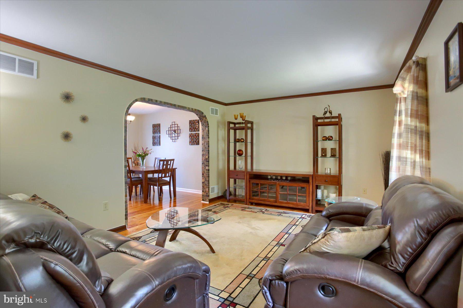 908 Sunnyside Road Hummelstown, PA 17036 - Photo 12 of 41 a living room with furniture and a large window
