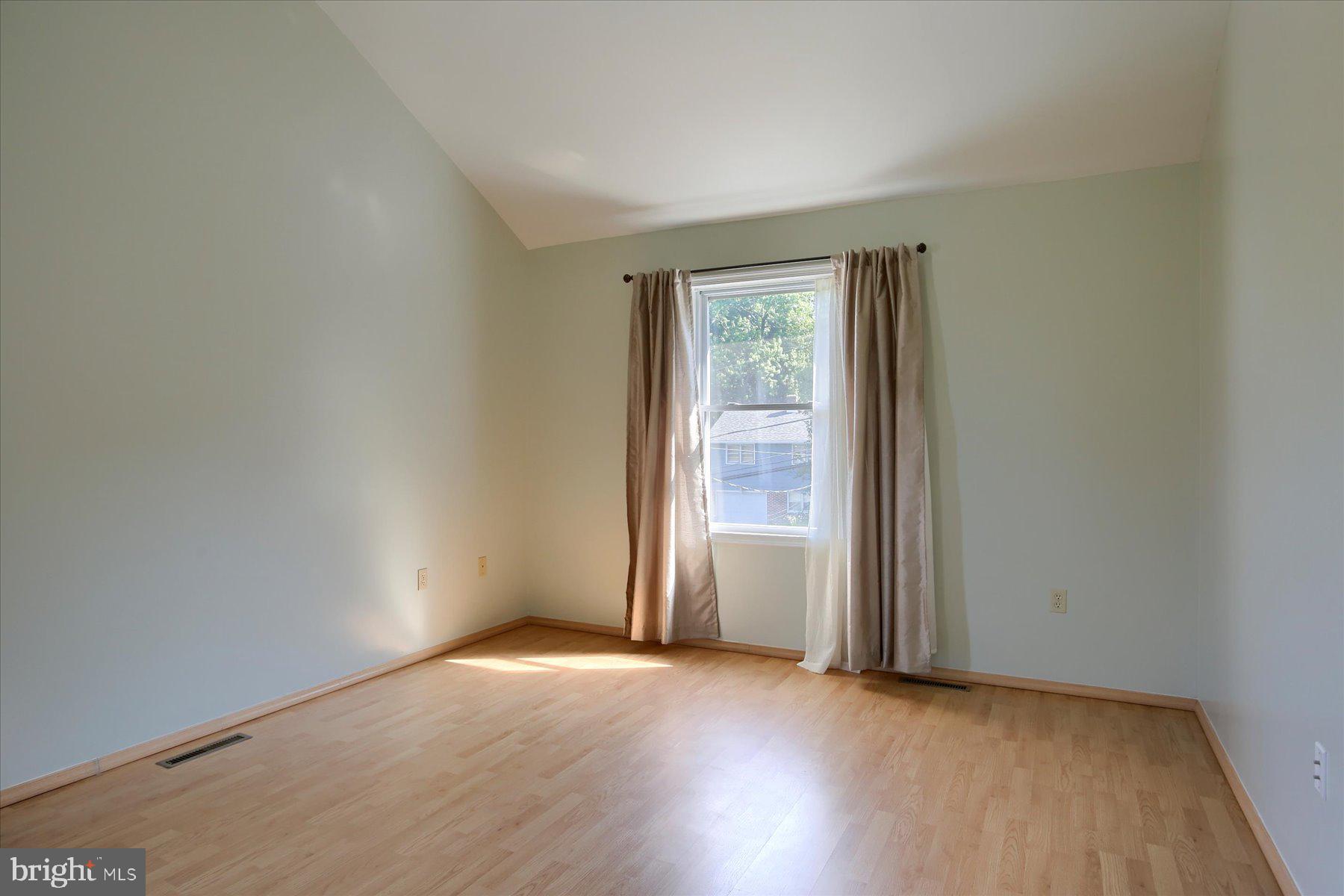 908 Sunnyside Road Hummelstown, PA 17036 - Photo 20 of 41 an empty room with wooden floor and windows