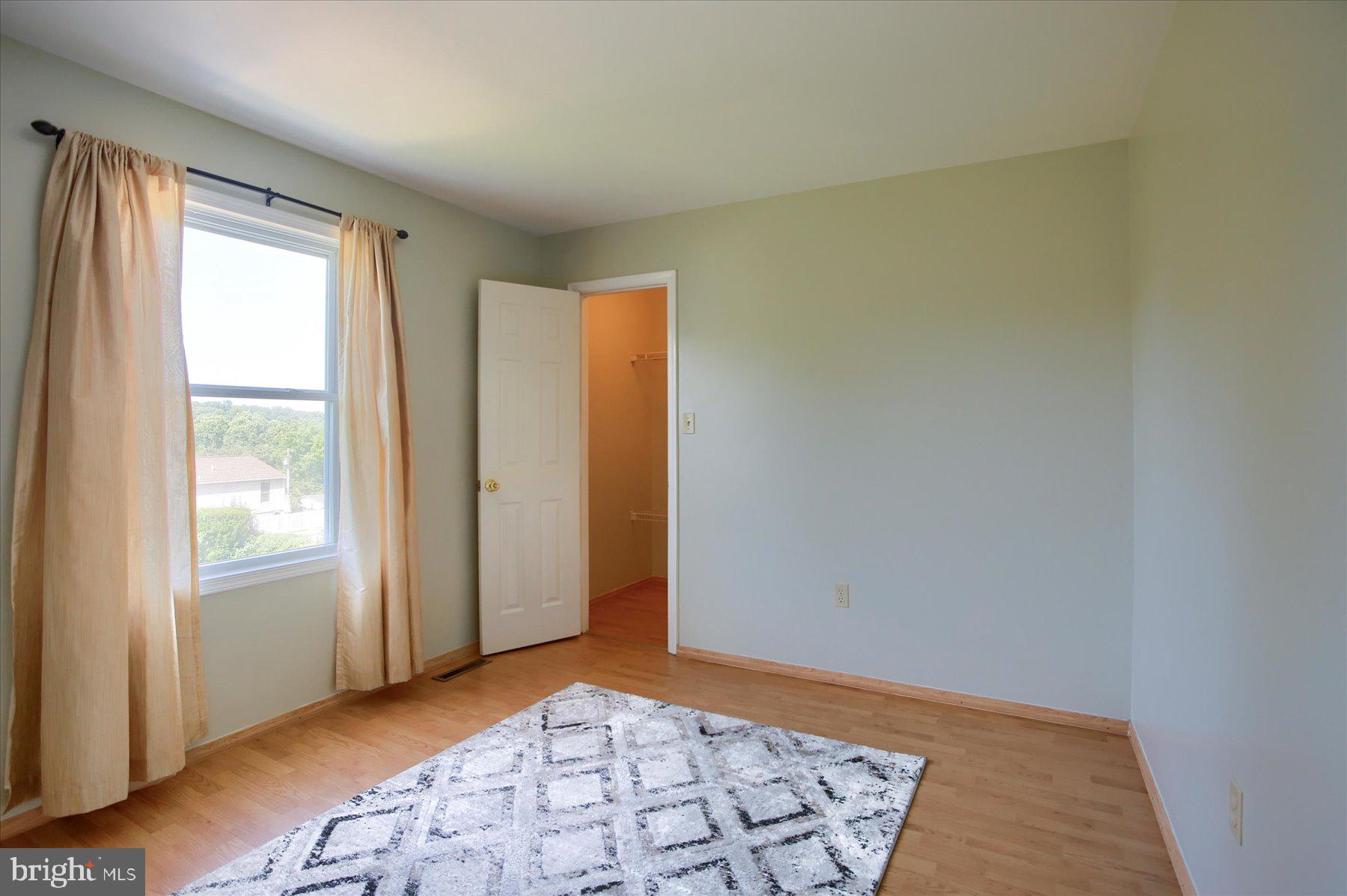 908 Sunnyside Road Hummelstown, PA 17036 - Photo 21 of 41 a view of an empty room and window