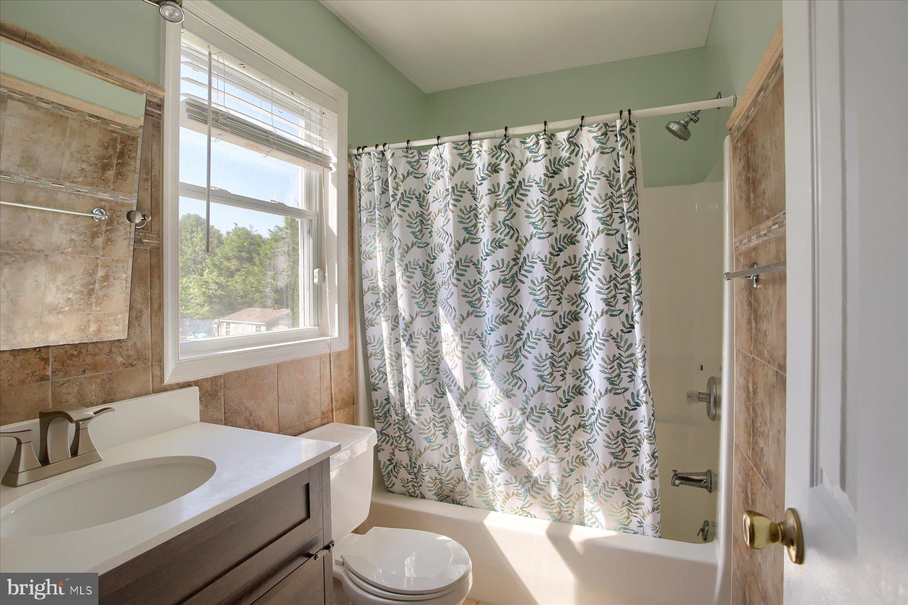 908 Sunnyside Road Hummelstown, PA 17036 - Photo 24 of 41 a bathroom with a sink toilet and shower
