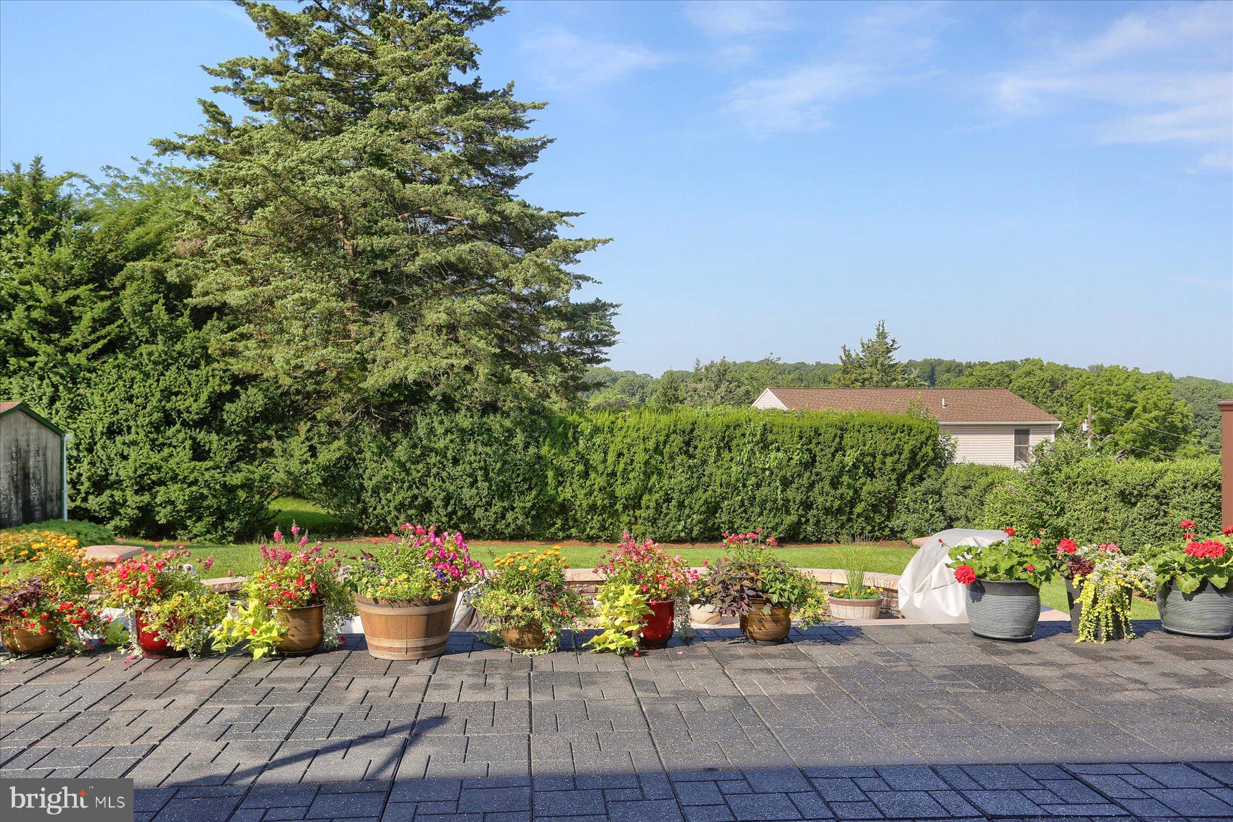 908 Sunnyside Road Hummelstown, PA 17036 - Photo 37 of 41 a view of a chairs and table on the wooden floor