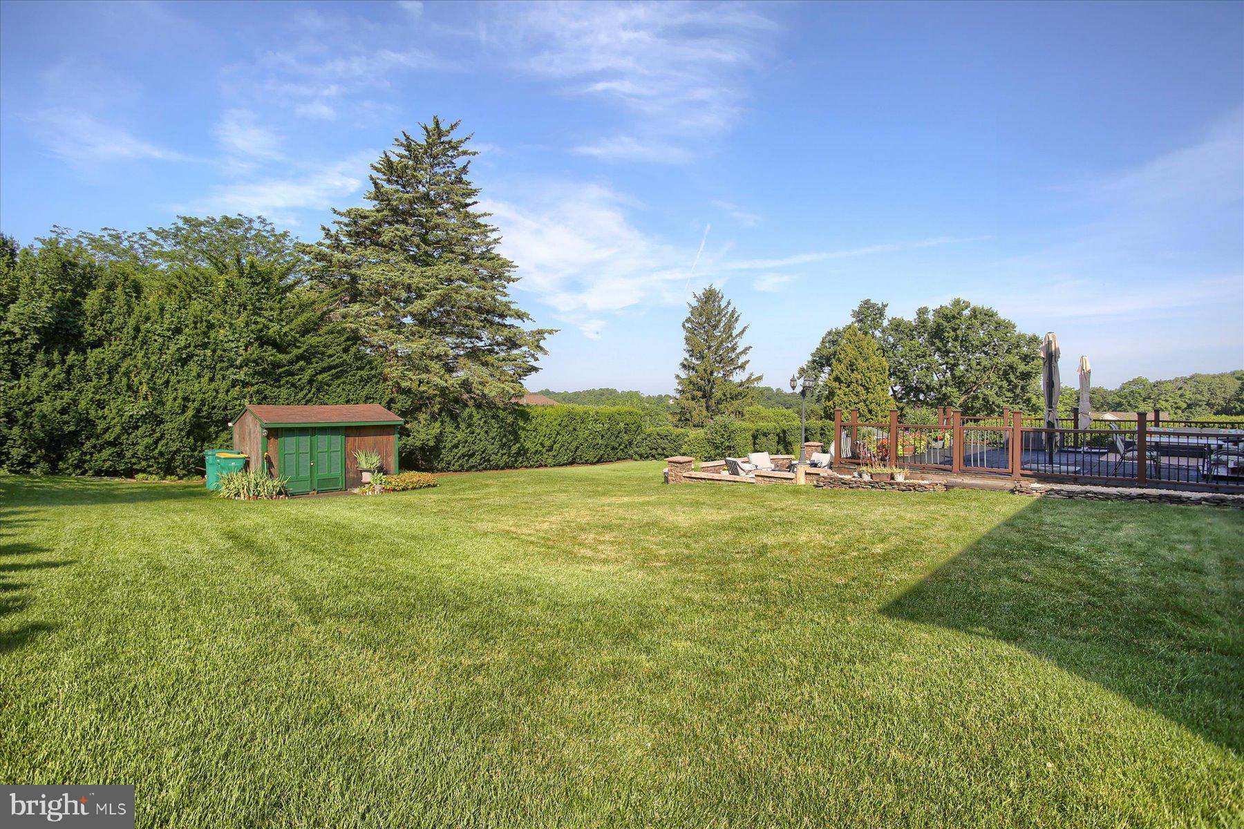 908 Sunnyside Road Hummelstown, PA 17036 - Photo 38 of 41 a view of a backyard with large trees