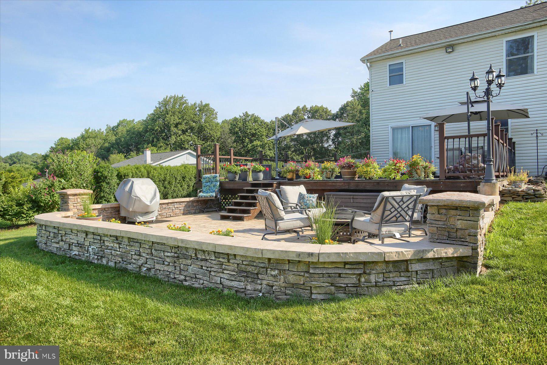 908 Sunnyside Road Hummelstown, PA 17036 - Photo 39 of 41 a view of a house with backyard and sitting area