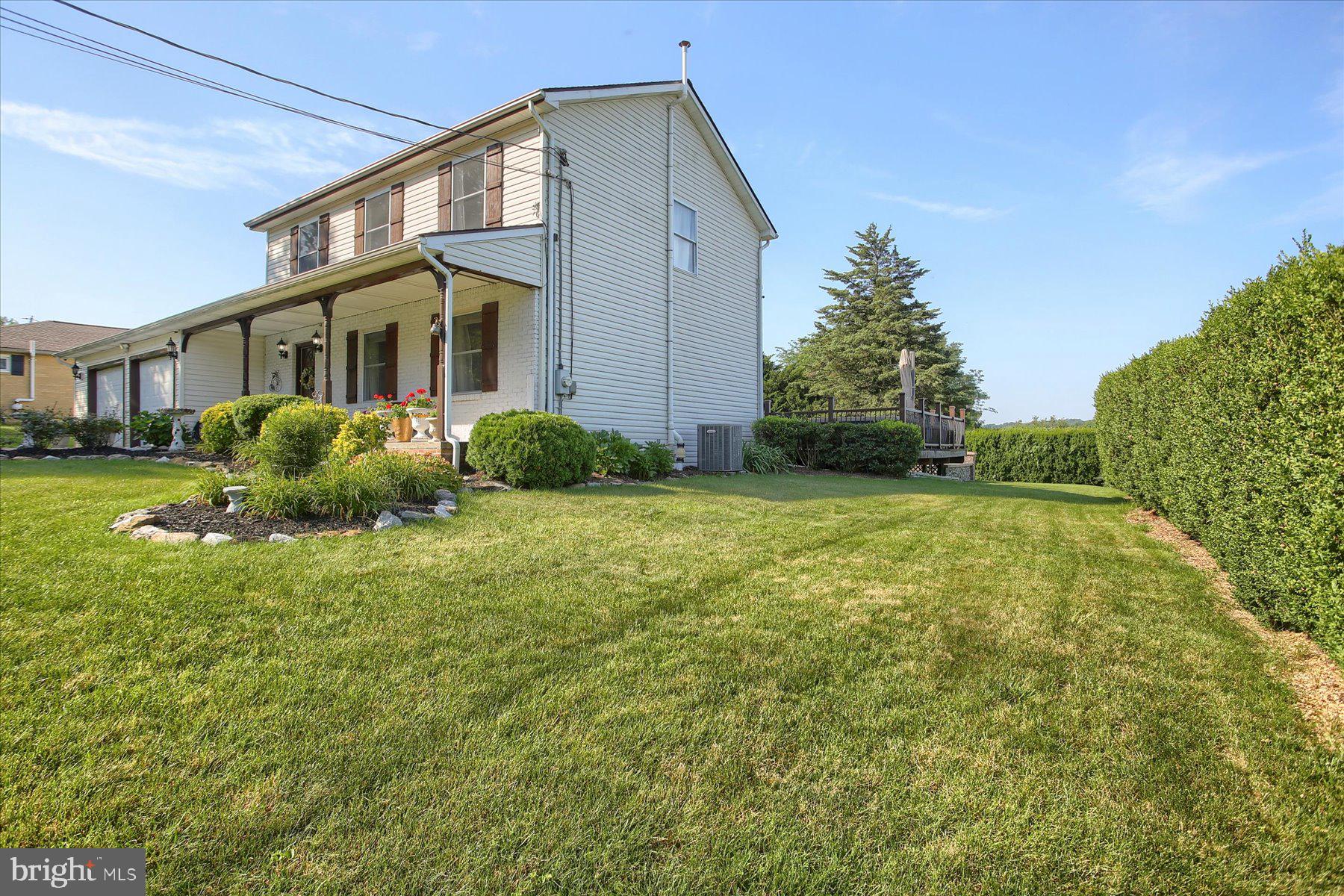 908 Sunnyside Road Hummelstown, PA 17036 - Photo 40 of 41 a front view of a house with garden