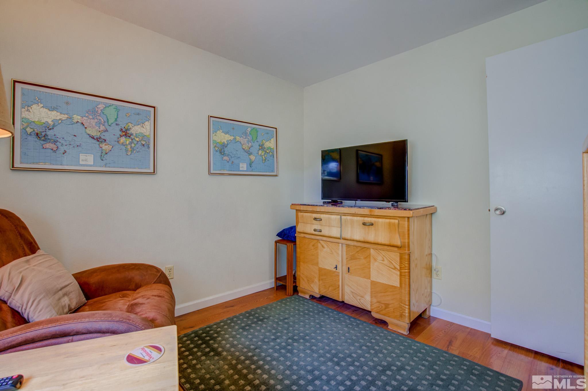 1208 Laredo Court Reno, NV 89503 - Photo 15 of 30 a storage room with furniture and flat screen tv