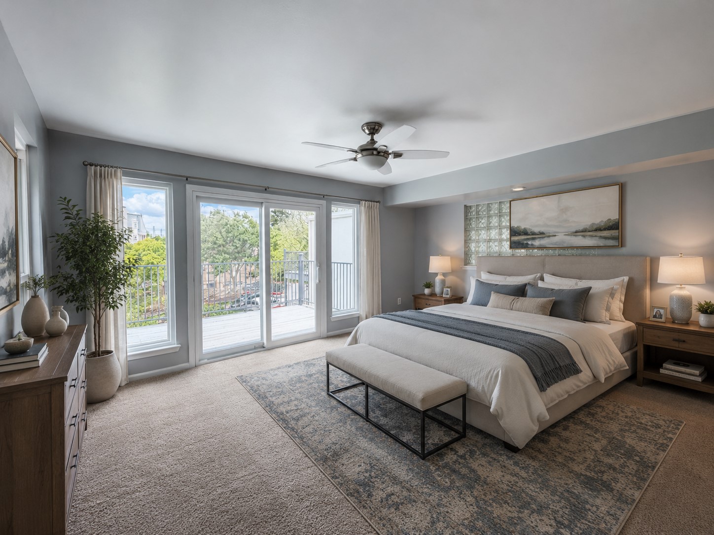 2918 Ranch Road 620 North, Unit C120 Austin, TX 78734 - Photo 17 of 34 Ai Virtual Staging: The primary bedroom features a ceiling fan and a glass block window that adds privacy to the upstairs area.