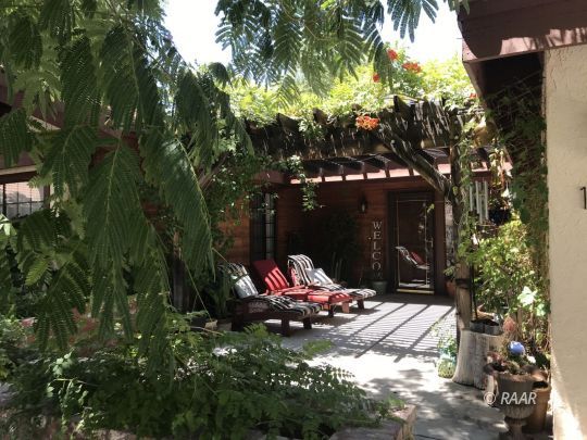 1009 Meadowview Lane Ridgecrest, CA 93555 - Photo 4 of 32 a view of a outdoor space with plants and tree