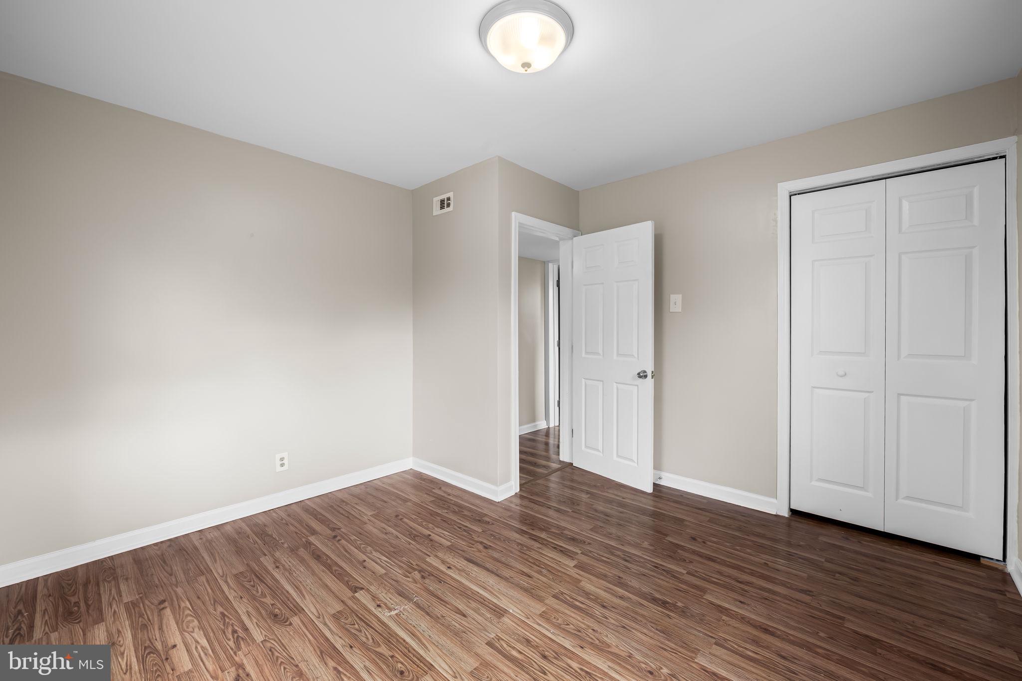 43 Liberty Street Aberdeen, MD 21001 - Photo 11 of 12 a view of an empty room with wooden floor