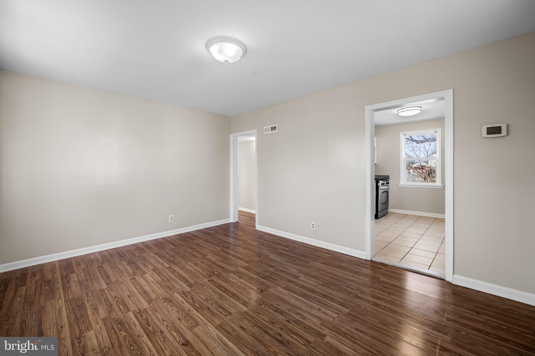 43 Liberty Street Aberdeen, MD 21001 - Photo 4 of 12 wooden floor in an empty room