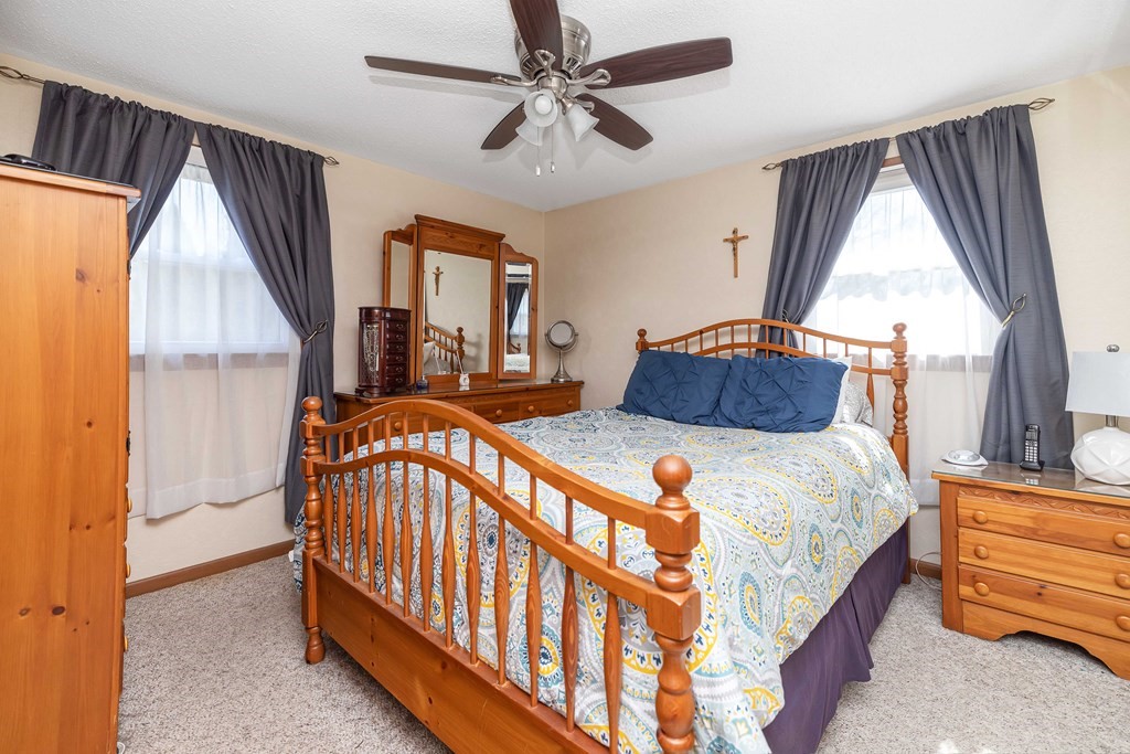 20 Murphy Lane Chicopee, MA 01020 - Photo 11 of 22 a bedroom with a bed and a window