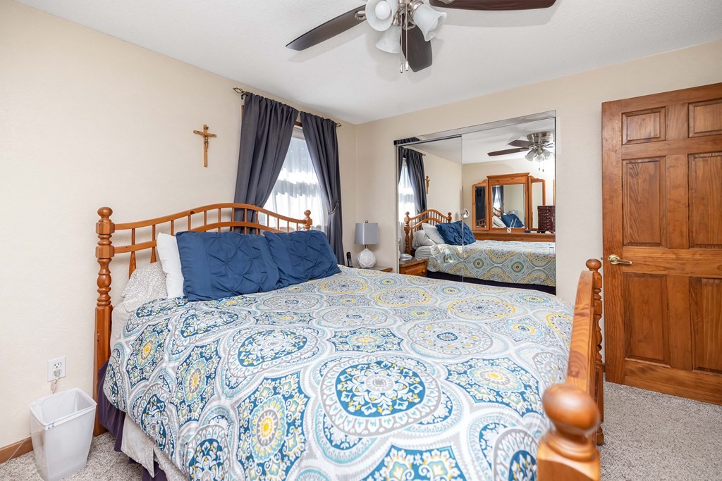 20 Murphy Lane Chicopee, MA 01020 - Photo 12 of 22 a bedroom with a bed and wooden floor