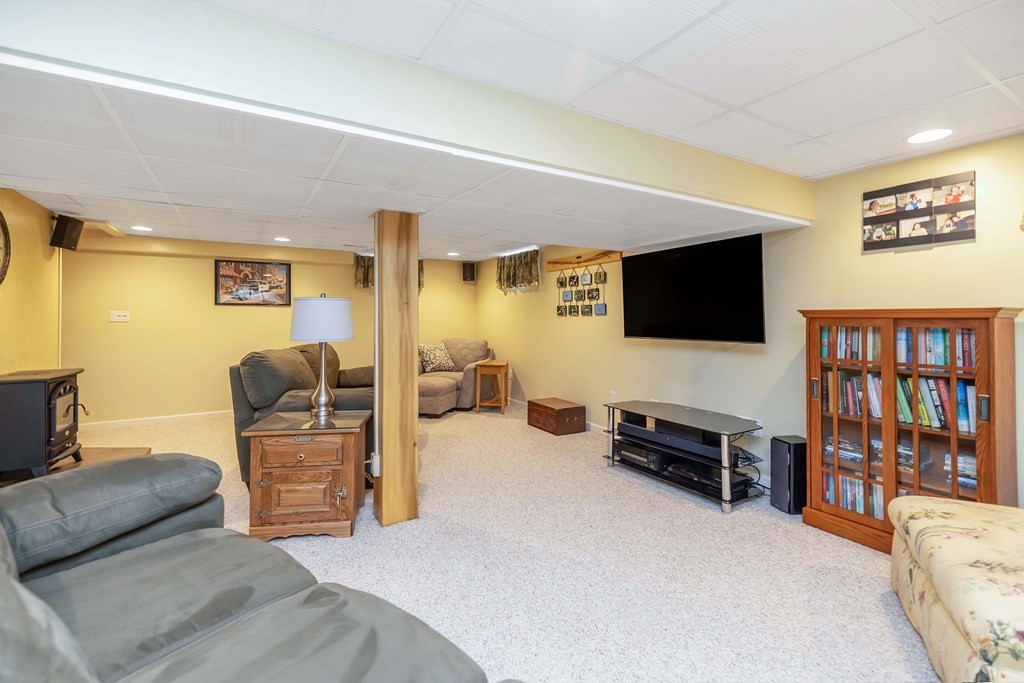 20 Murphy Lane Chicopee, MA 01020 - Photo 14 of 22 a living room with furniture and a flat screen tv