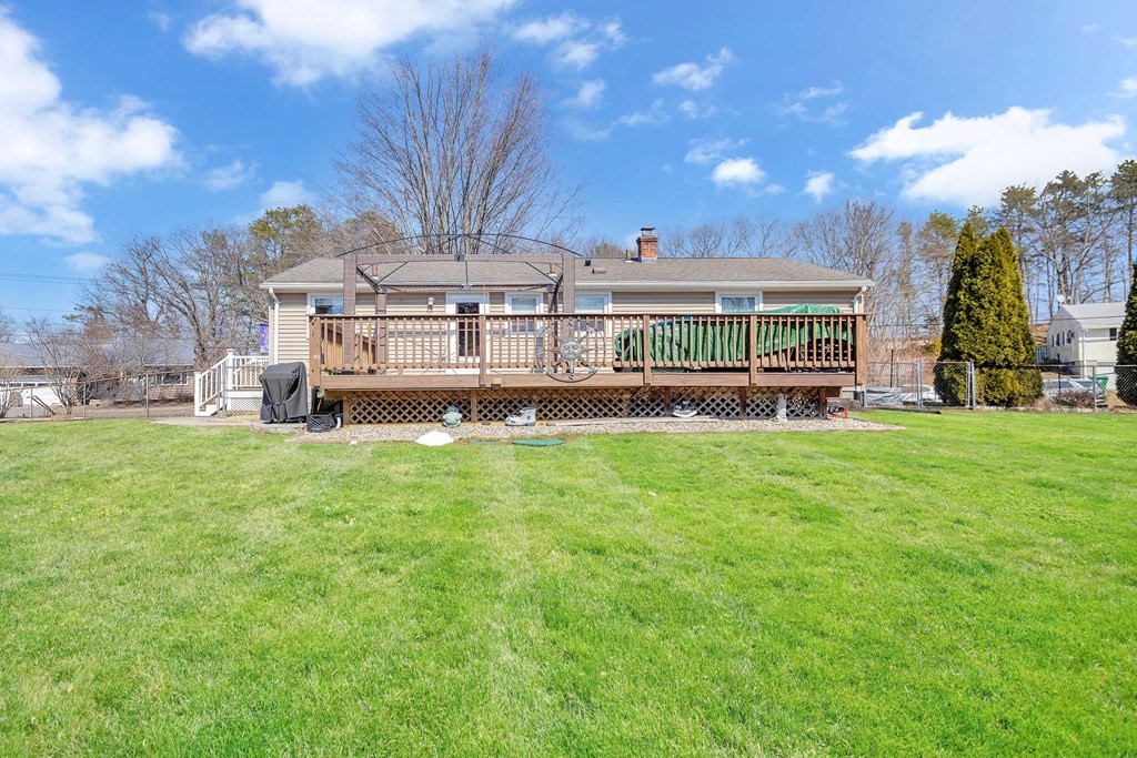 20 Murphy Lane Chicopee, MA 01020 - Photo 18 of 22 a front view of a house with a yard table and chairs
